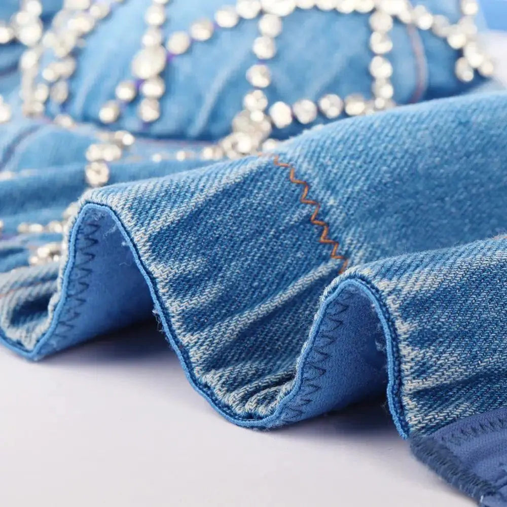 Cassie Embellished denim bustier top in blue