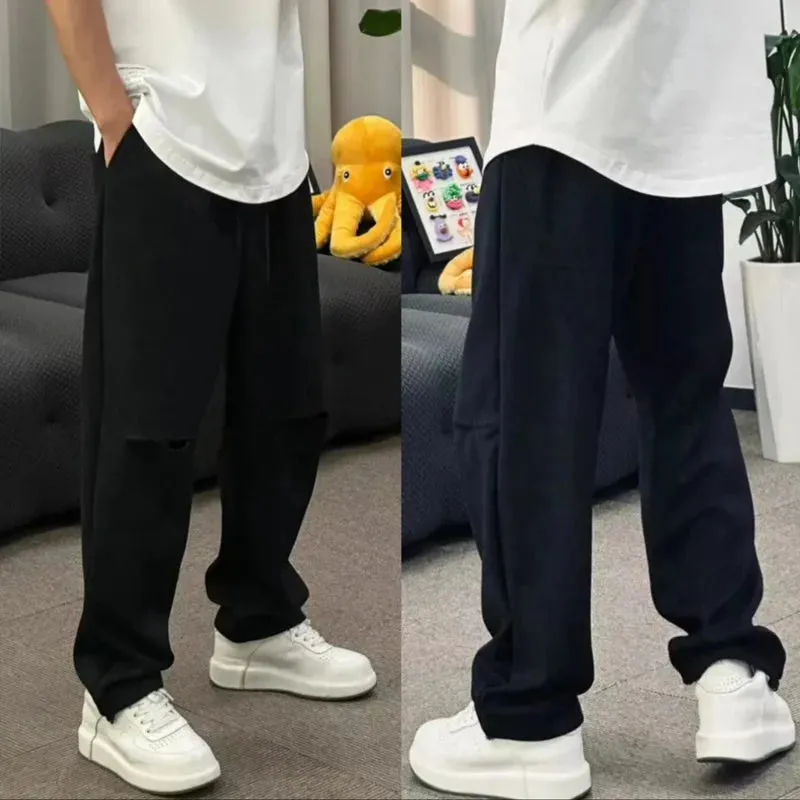 Wiaofellas  -  Casual Solid Color Loose Straight Trousers Fashion Ice Silk Pants Men's Drawstring Hollow Out Baggy Sweatpants Streetwear